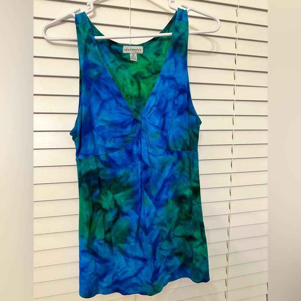 Ladies size medium sleeveless v-neck in blues and greens like new
